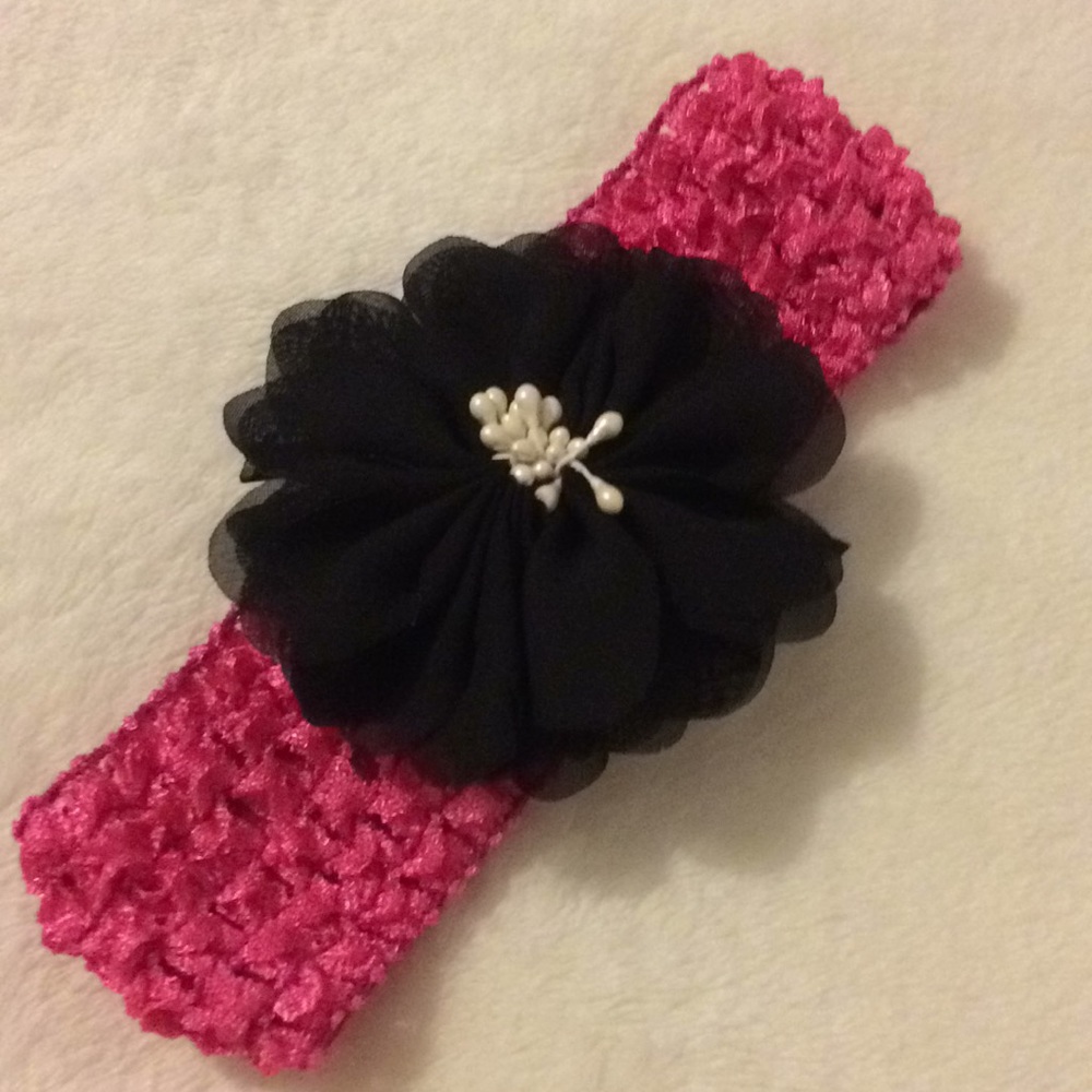 Hot pink crochet hair band with flower detail