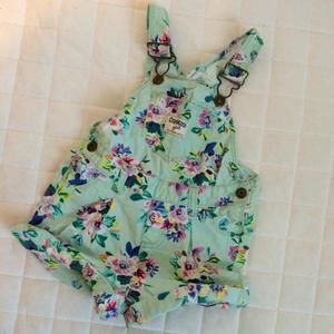 Floral jumper overalls.