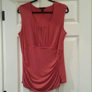 Orange sleeveless blouse