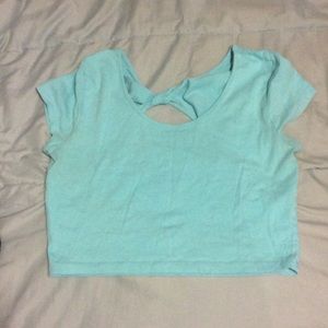 Baby blue crop top , crossed in the back