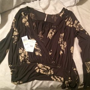 Free people front coal color tunic!