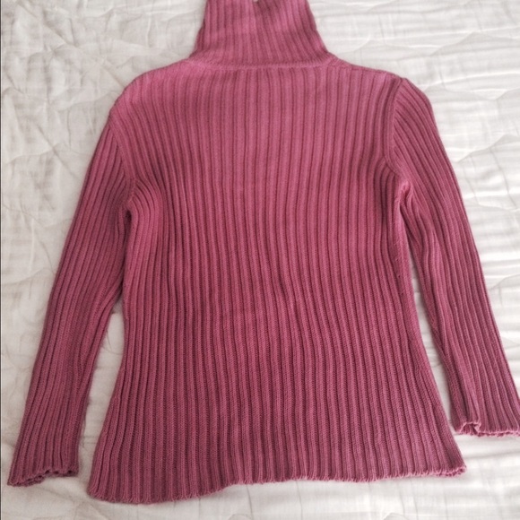 Pink turtleneck sweater