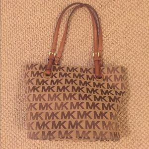 Michael Kors Monogram Signature tote.