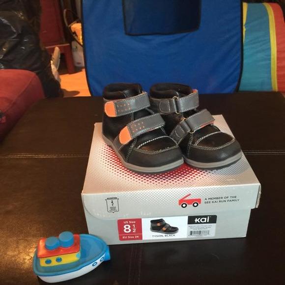 See Kai run Tyson black, fur lined, double strap leather boot size 8.5