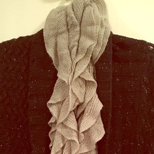 Black cardigan and ruffled soft grey scarf