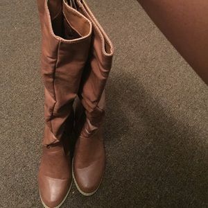 Leather boots. About knee high