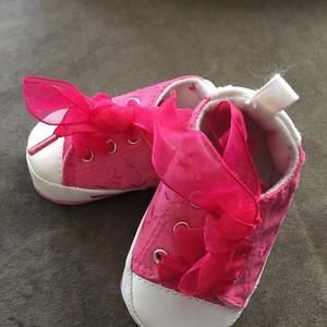 Bright pink baby sneakers