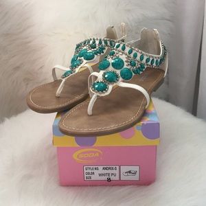 White sandals with real embellishment