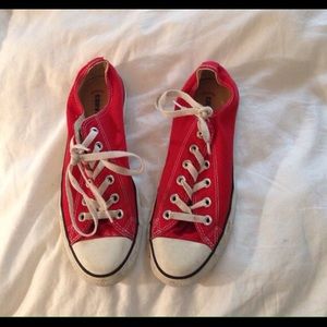 Red low top converse sneakers