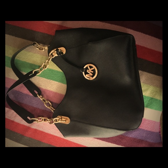 Michael Kors black bag in great condition.