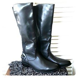 Black knee high boots with buckle detail