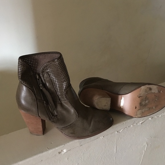 Report man made booties grayish green color