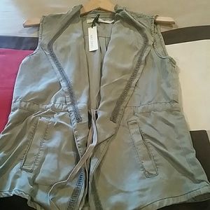 Super cute! Olive green vest..great accent piece