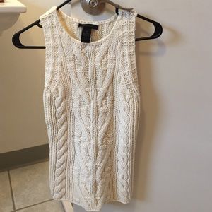 Limited sleeveless sweater