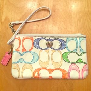 Multicolored coach wristlet, never been used!!