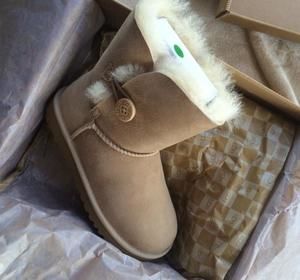 $$Brand new$$ Bailey button UGGs. Sand color.