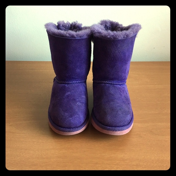 Purple Ugg Boots with Pink Bows.