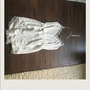 Kittenish white lace romper