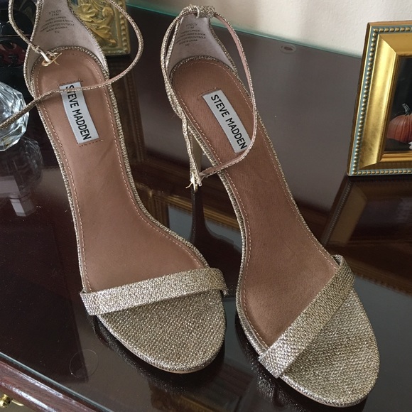 Gold ankle strap stilettos