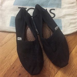 Toms black shoes in size 7