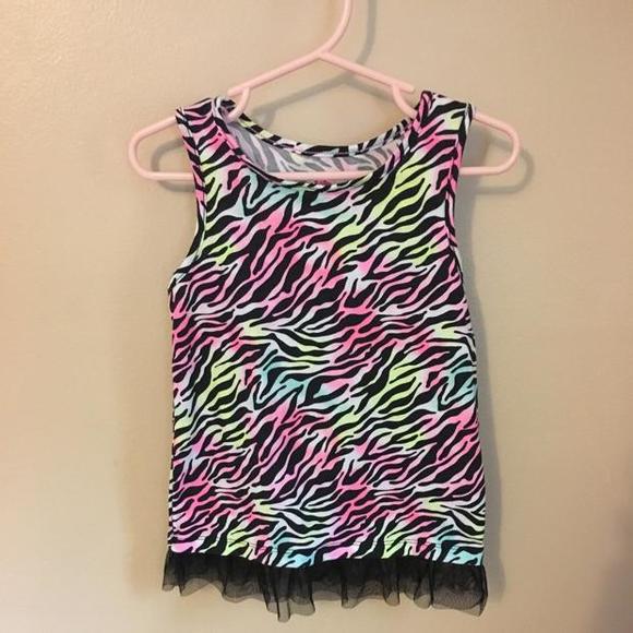 Colorful zebra shirt with tulle bottom.