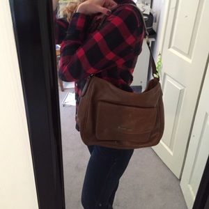 Brown leather tote handbag