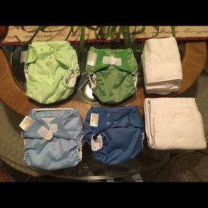 Four bumGenius Diapers.