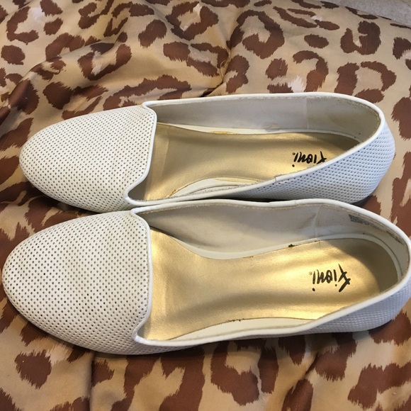 White textured slide-on shoes