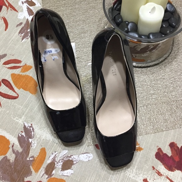 Patent leather peep toe pumps