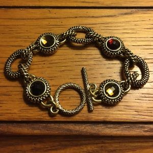 Lia Sophia gold bracelet! Has a matching necklace!