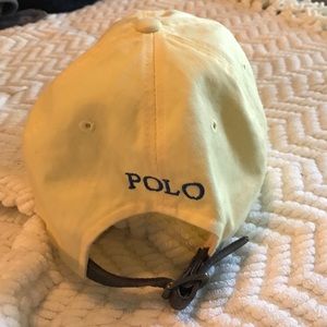 Yellow Polo hat.