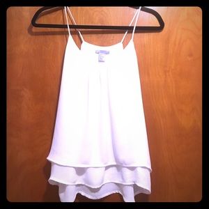 White sleeveless blouse