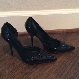 Black patent leather heels.