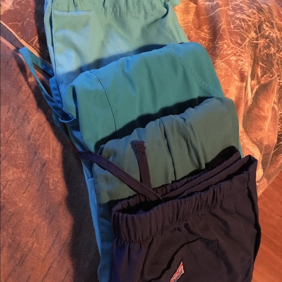 Four teal/blue small scrub pants bundle