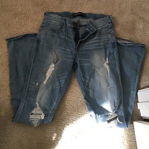 Light blue jeans with holes