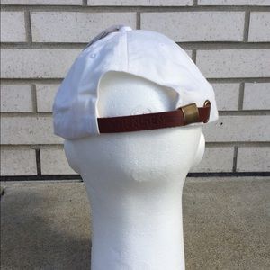 white hat leather strap