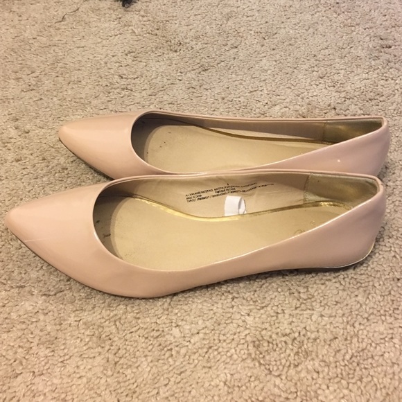 Pointed toe flats with gold on heel