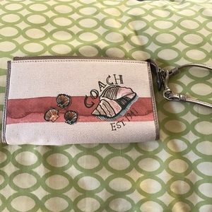 Coach. Seashell wristlet