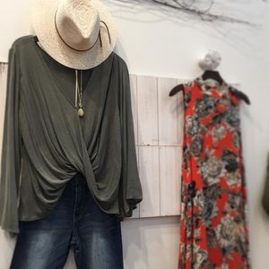 Surplice bell sleeve blouse