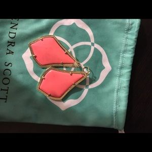 Kendra Scott earings in coral.
