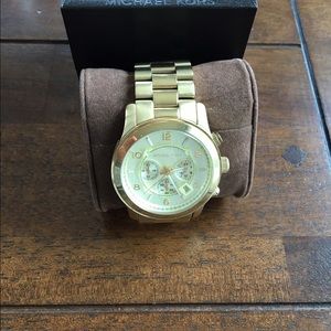 MK gold watch