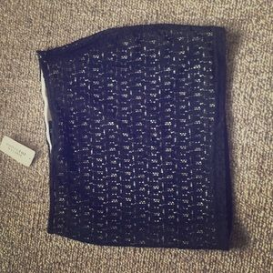 Mini black and nude skirt