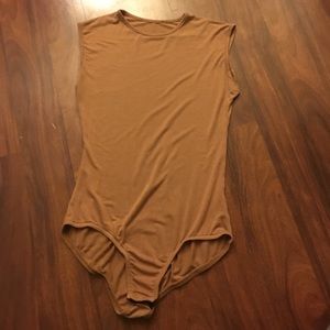 Tan body suit