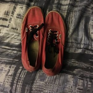 Red vans with black laces