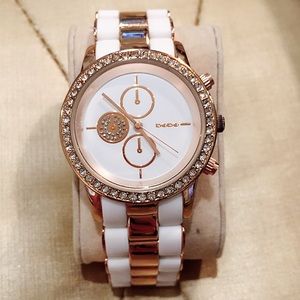 Bebe Diamond Face Rose Gold & White Band