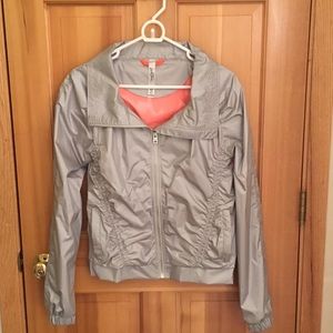 Silver puckered workout jacket.