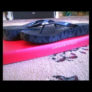 Black Michael Kors slip one (or flip flops)