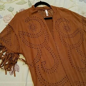 Super cute vest cover up, Western style.