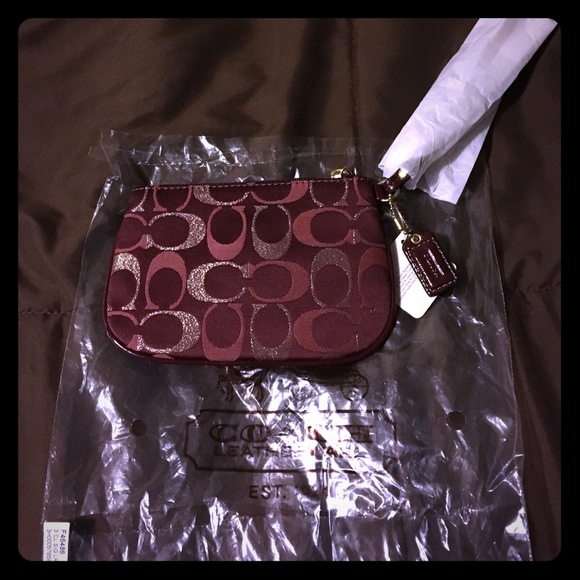 Authentic coach wristlet.
