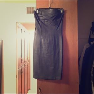 Leather-like fitted cocktail dress.